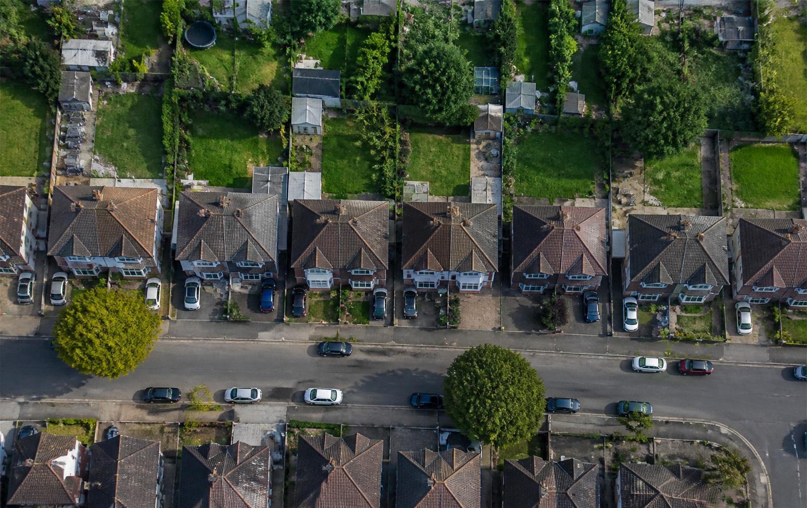 Aerial satellite-style view of UK house roofs